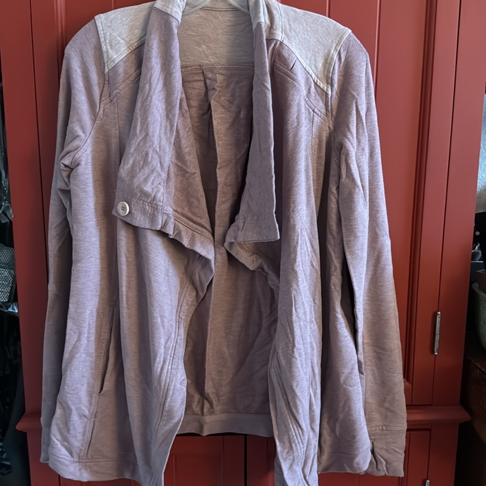 Lululemon Coast Wrap Sweater Size 6
Two tones of purple with button closure